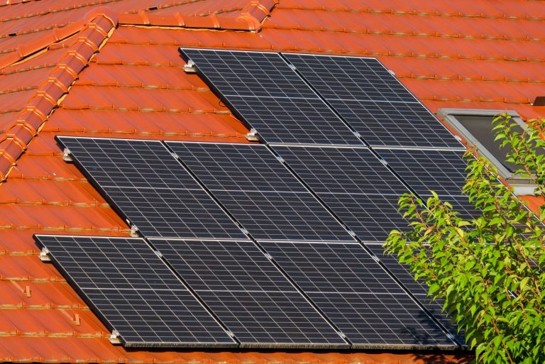 Solar panels on a terracotta tiled roof